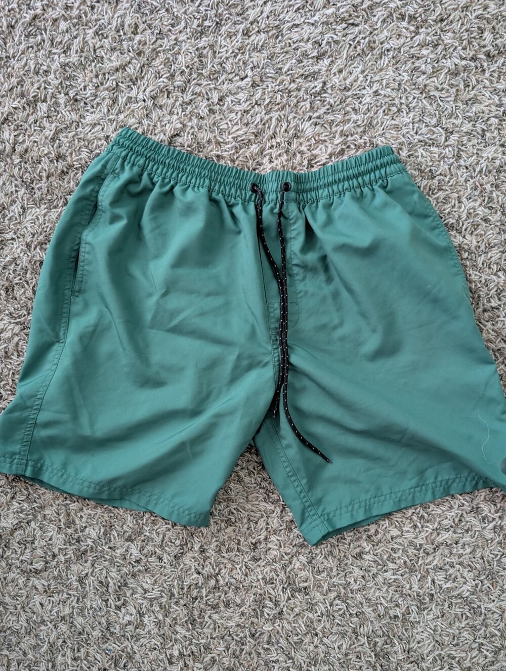 Outerknown Men's Swim Trunks in Deep Green with Black Drawstring